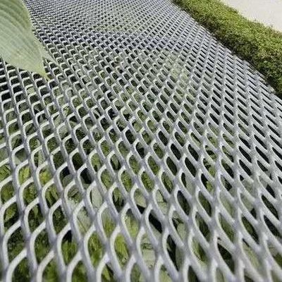 熱い浸された電流を通された格子は拡大された金属線の網を伸ばした